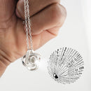 Silver Amore Box Necklace with I Love You in 100 Languages - Hand holding projection necklace